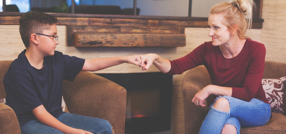 Foster Parent and Foster Child Fist Bump