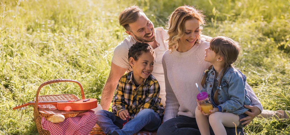 Smiling Foster Family at Picnic